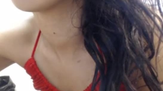 Sex cam model shows off her body